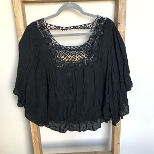 Lace detailed black flowy blouse